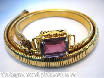 Schreiner one large rectangle faceted open back emerald cut purple goldtone jewelry