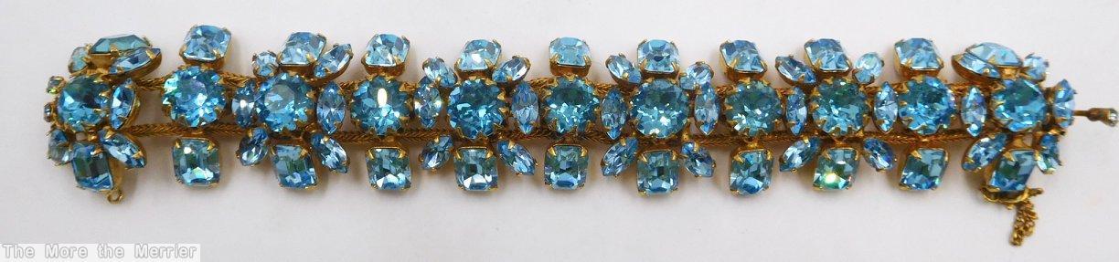 Schreiner 2 strand 11 round cab 12 small navette center row blue goldtone jewelry