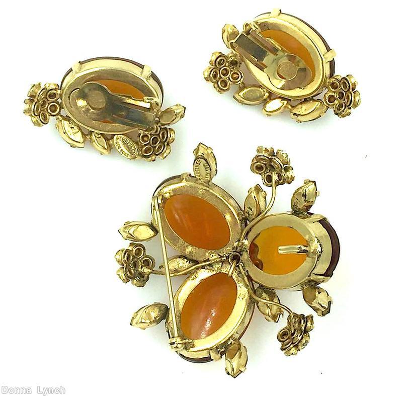 Schreiner 3 large oval radial double triangle pin 4 flower head topaz large oval cab peridot navette goldtone jewelry