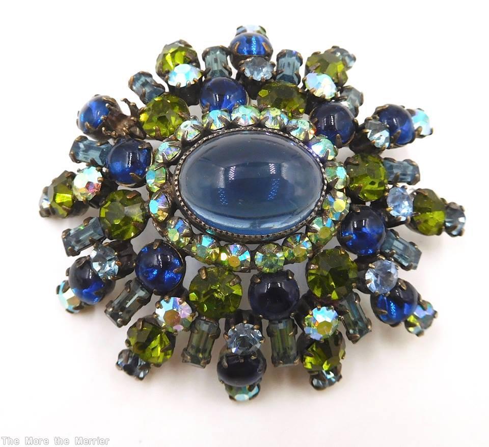 Schreiner 5 rounds varied length domed radial oval pin large oval center 16 small surrounding chaton small baguette pale navy peridot ab smoky blue smoke jewelry