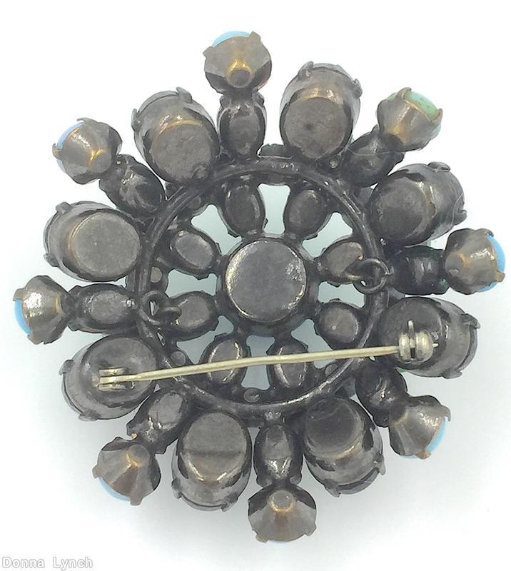 Schreiner domed radial round pin 3 rounds 8 surrounding stone chaton center large circle wire frame moonglow aqua emerald apple green plum jewelry