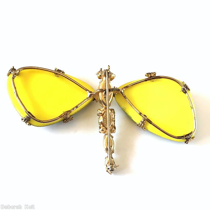 Schreiner dragonfly pin 2 large triangle marblelized stone wing 1 large navette 1 large oval stone 2 navette 6 small chaton 2 chaton eye 2 long antenna green marblelized large stone moonglow apple green chaton clear champagne navette ruby chaton eye goldtone jewelry