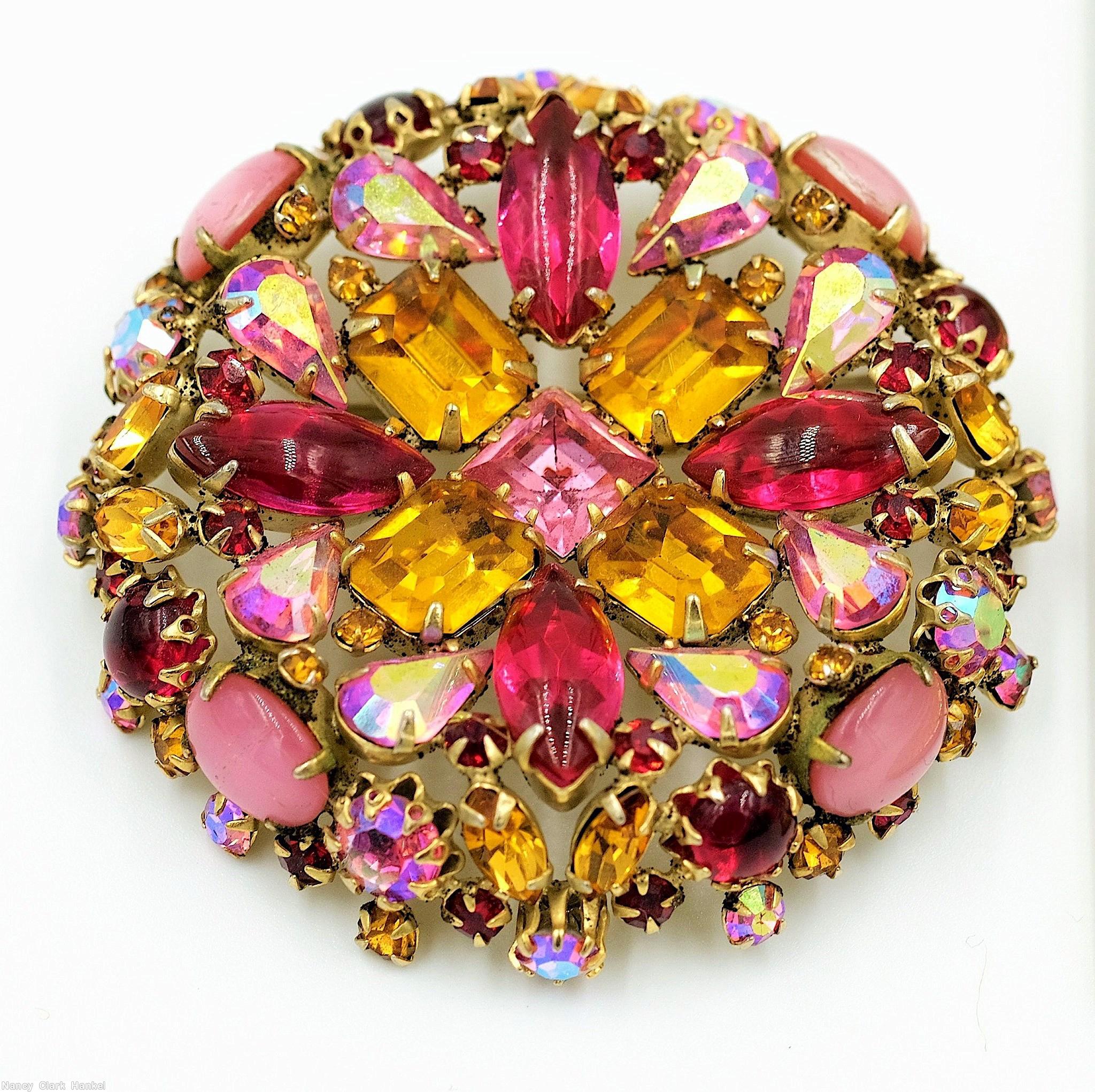 Schreiner hexagonal domed radial concave flat top pin small chaton center 6 surrounding navette 6 round stone on side wall amber emerald cut fuschia navette ab faceted teardrop moonglow opaque pink ruby chaton goldtone jewelry