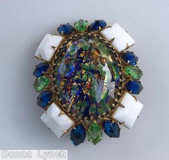 Schreiner large oval cab center radial domed oval pin 4 large square stone 12 navette multicolor large oval cab center white square stone navy green goldtone jewelry