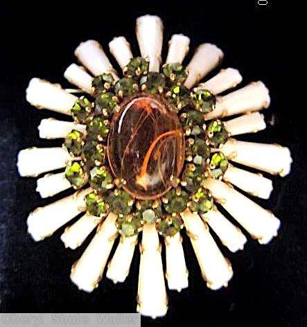 Schreiner oval high domed keystone ruffle pin large oval center varied length keystone white keystone marbled amber large oval cab center peridot 2 round surrounding chaton goldtone jewelry