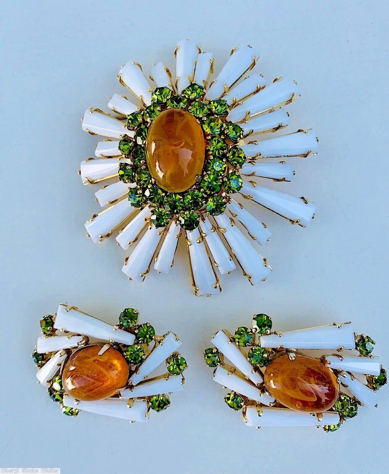 Schreiner oval high domed keystone ruffle pin large oval center varied length keystone white keystone marbled amber large oval cab center peridot 2 round surrounding chaton goldtone jewelry