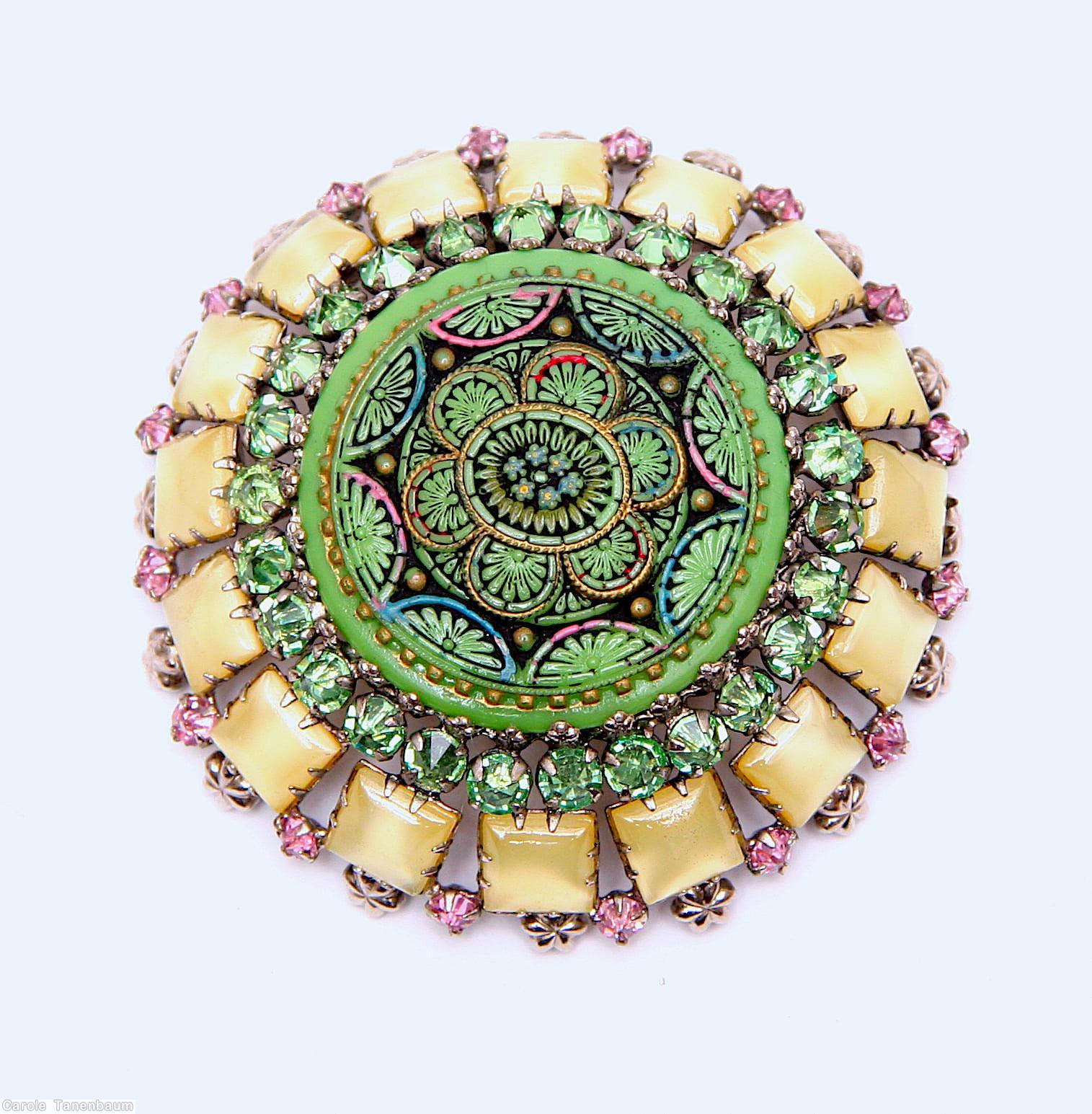 Schreiner round domed moroccan disc center pin 16 square stone surrounding small chaton green moroccan disc ivory square stone green inverted stone ice pink small chaton jewelry