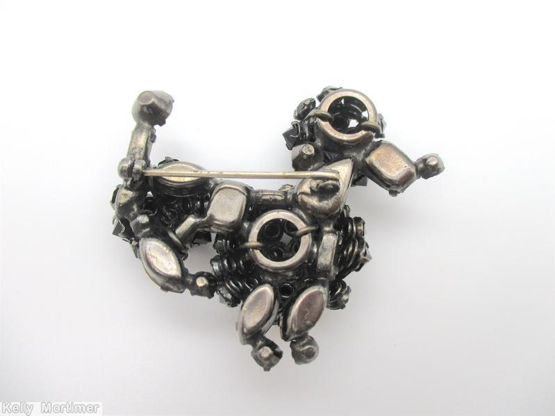 Schreiner sitting poodle pin jet inverted stone large smoky emerald cut ruby small chaton silvertone jewelry
