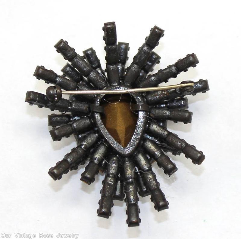 Schreiner small spoke spider radial 2 level pin varied length baguette branch large teardrop center crystal japanned jewelry