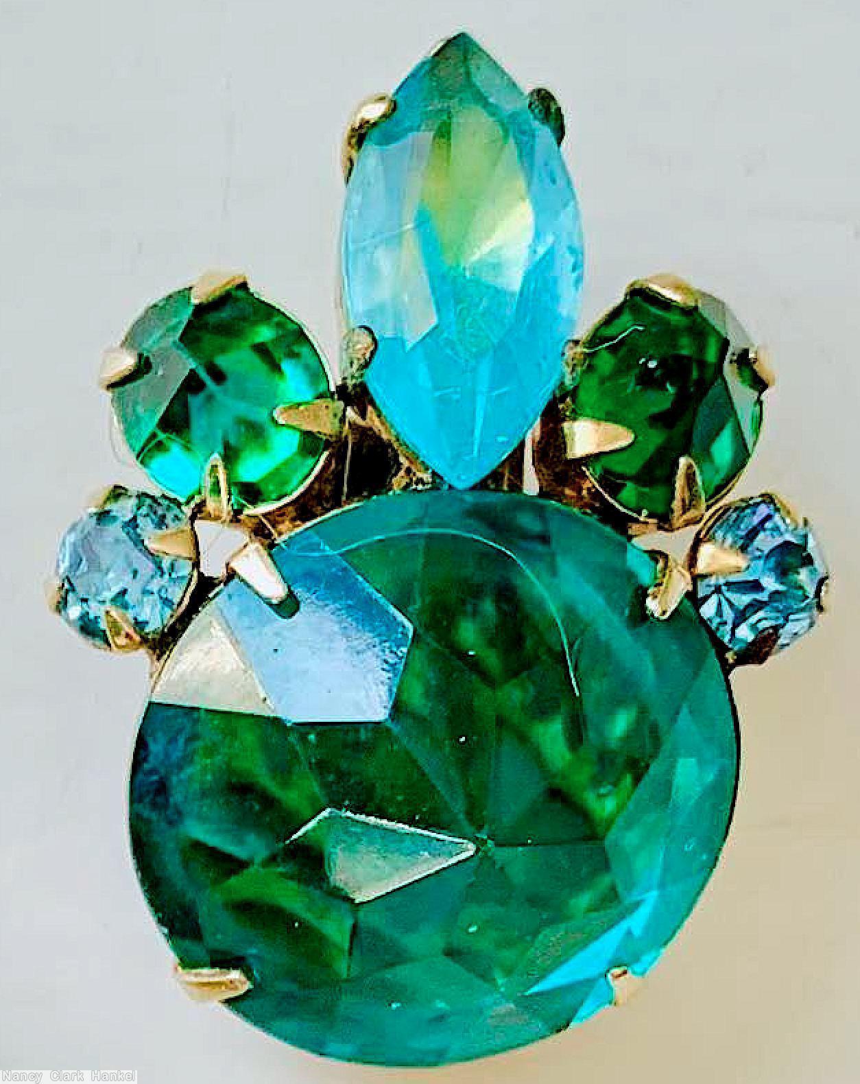 Schreiner asymmetric earring 1 large round inverted stone center 1 large navette 2 chaton 2 small chaton aqua green bicolor navette green faceted large round cab goldtone jewelry