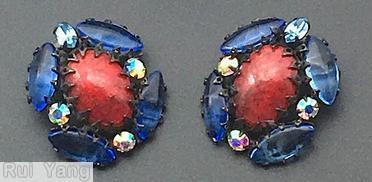 Schreiner radial earring 1 large oval cab center 1 round surrounding 4 navette 4 small chaton marbled red large oval cab marina blue navette ab small chaton jewelry