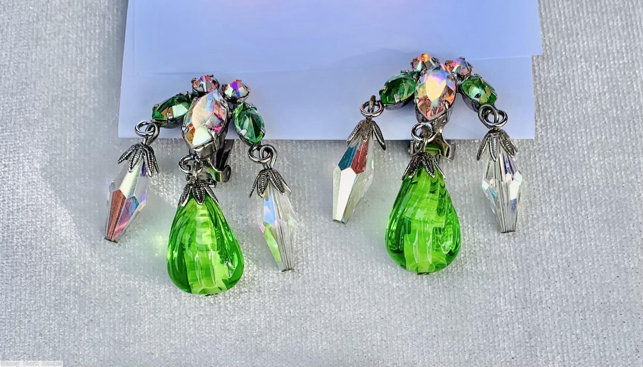 Schreiner top down dangling earring 1 large dangling teardrop in the middle 2 large diamond shaped dangling bead top 3 navette 2 small chaton clear green molded large teardrop faceted diamond shaped crystal bead small ab chaton green navette ab large navette silvertone jewelry