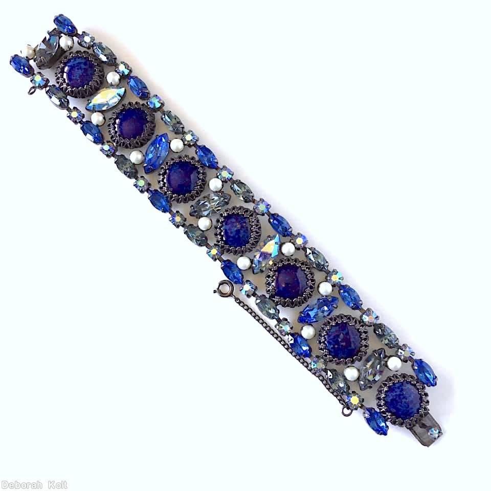 Schreiner 3 row 7 large round cab 7 tilted navette center row faux pearl navette small chaton side row lapis large round cab ab blue crystal jewelry