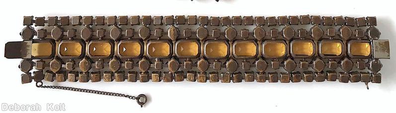 Schreiner 5 rows 12 large emerald cut center row small chaton border row small square stone small chaton row large emerald cut topaz champagne small chaton small square carnelian small topaz square copper back jewelry