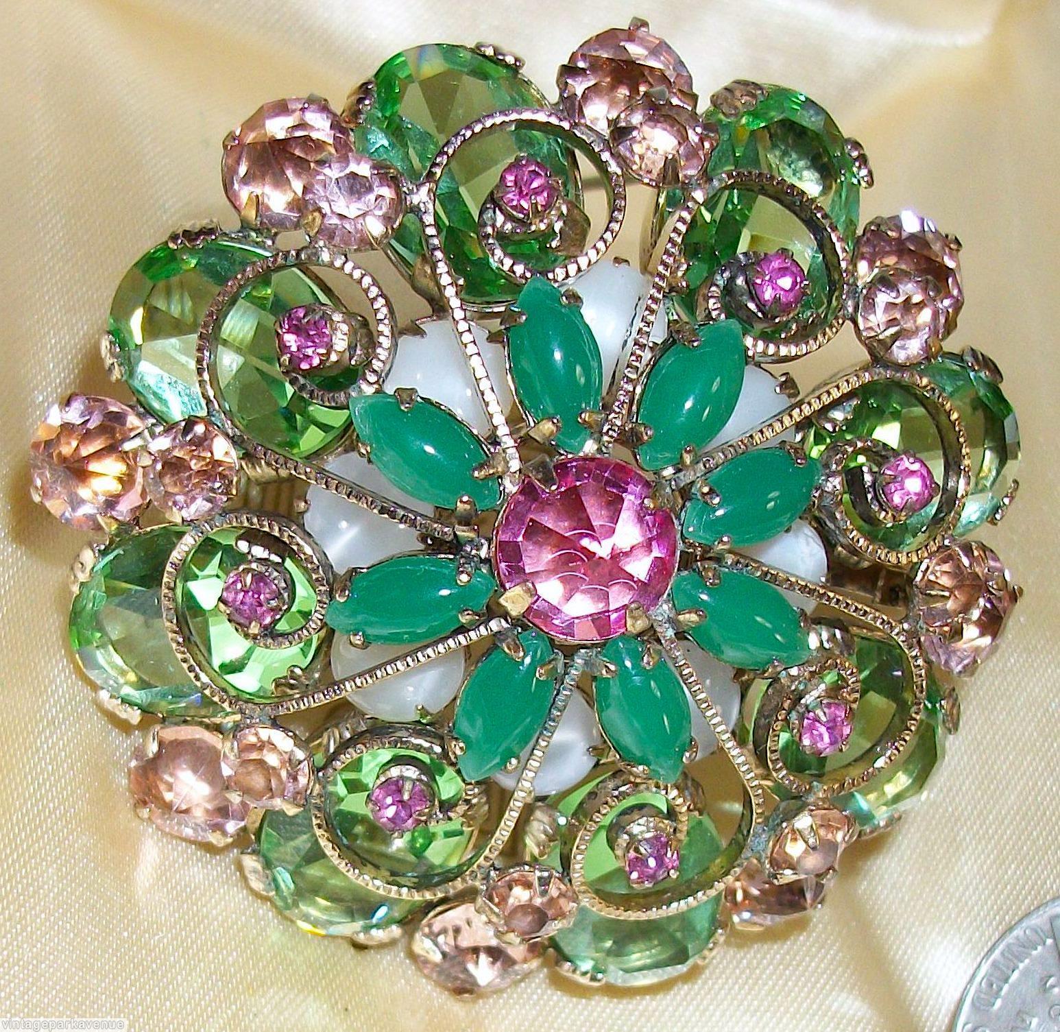 Schreiner 2 level 8 scrollwork radial pin large round chaton center 8 surrounding navette bottom 8 large oval stone 8 large round cab celery green large faceted oval stone jade navette fuschia large inverted round center peach inverted large stone moonglow white round cab goldtone jewelry