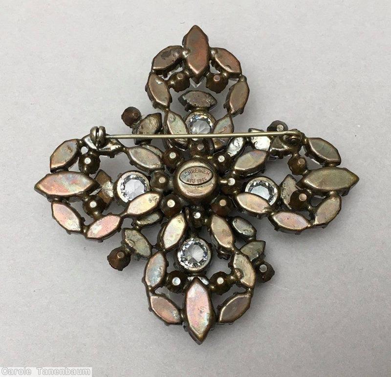 Schreiner 2 level radial cross pin large round stone center bottom level 8 surrounding small teardrop top level 8 surrounding small teardrop fuchsia crystal jewelry