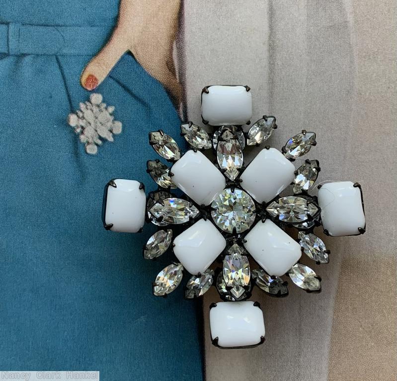 Schreiner 2 level radial cross pin top level chaton center 4 emerald cut 4 navette surrounding bottom 4 emerald cut 12 navette milk white emerald cut crystal navette gun metal back jewelry