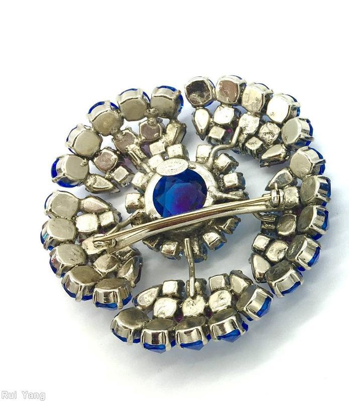 Schreiner 5 petal of many small inverted stone large faceted chaton center blue fuchsia ice blue bicolor ruby blue jewelry