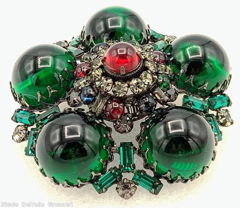 Schreiner 5 round cab radial pin round cab center 11 surrounding small chaton 15 small baguette green large round cab ruby center round cab crystal small chaton green small baguette jewelry