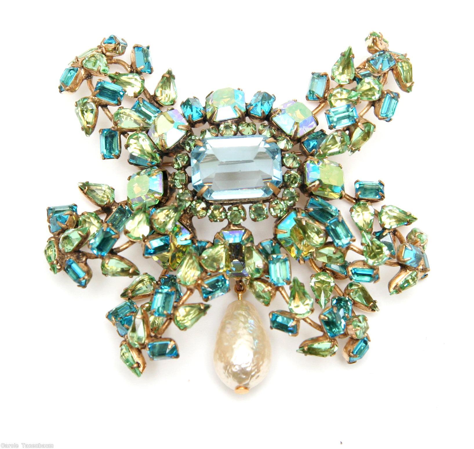Schreiner 6 flower branch large sprawling 1 dangle pin large square center 16 surrounding small chaton 1 large dangling teardrop apple green teardrop aqua baguette large large faceted emerald cut aquamarine center large baroque pearl goldtone jewelry