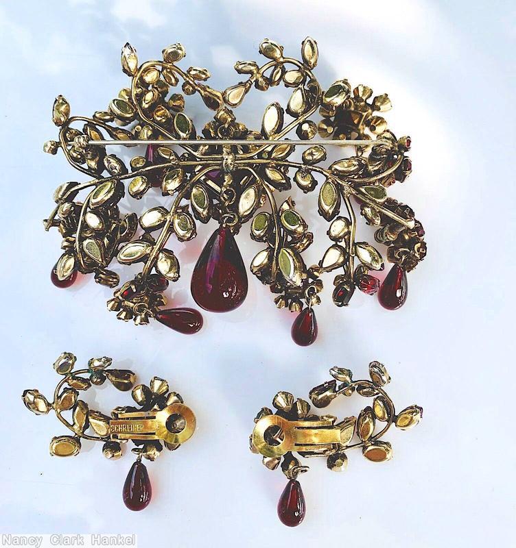 Schreiner 6 flower branch large sprawling 1 dangle pin large square center 16 surrounding small chaton 1 large dangling teardrop ruby goldtone jewelry