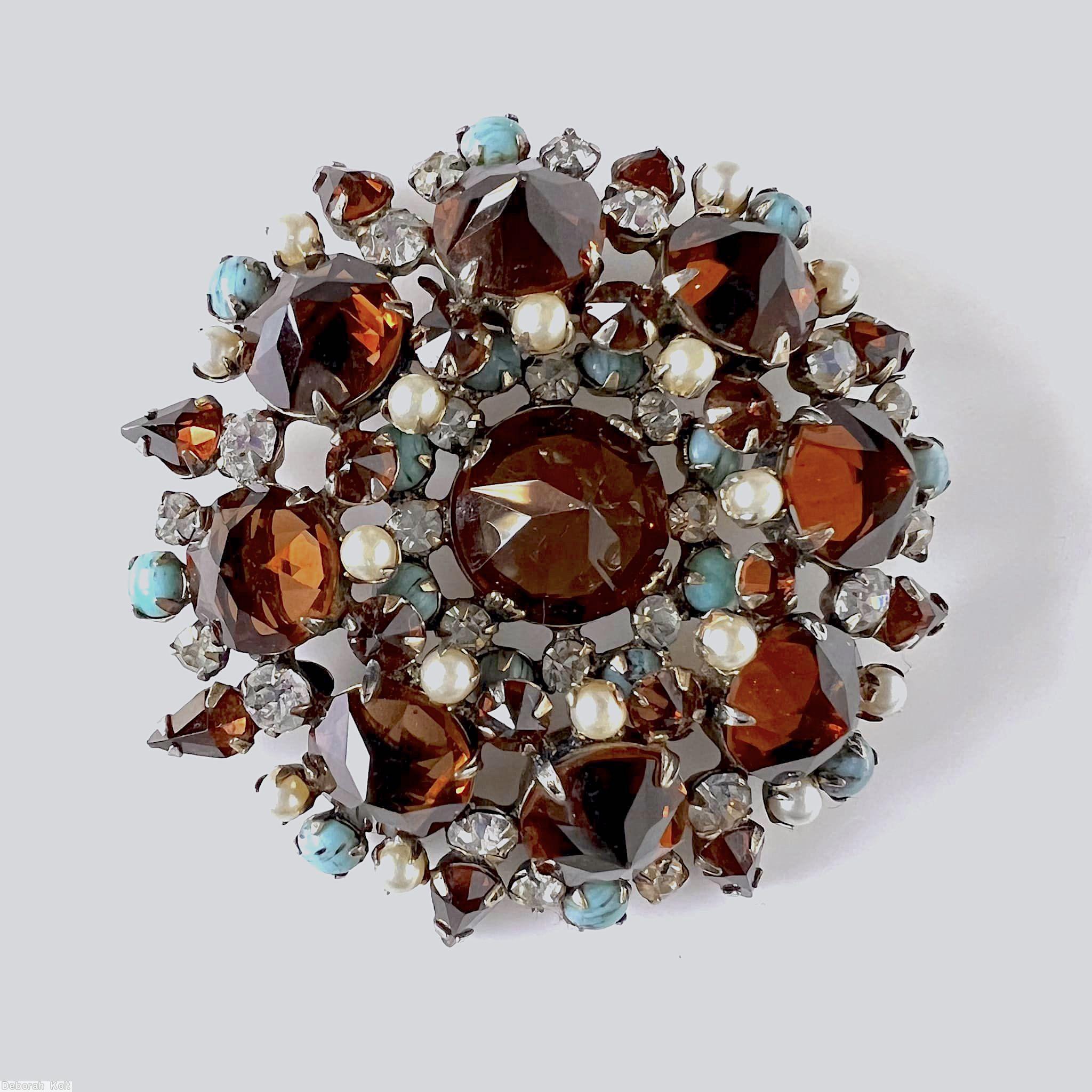 Schreiner 8 large pointy inverted stone wall round radial concave flat bottom pin large round stone center 8 small surrounding chaton small teardrop topaz large pointy stone small faux pearl small turquoise chaton small crystal chaton jewelry