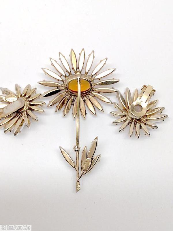 Schreiner black eye daisy pin long stem large oval center 20 petal 4 leaf white navette topaz large oval center jewelry