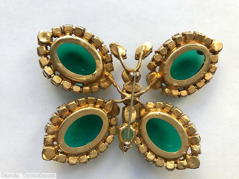 Schreiner butterfly pin 4 large oval cab wing surrounded by 18 chaton small navette antenna body 3 small oval stone 1 small teardrop emerald large oval cab crystal small chaton navy navette antenna small purple oval stone head small apple green teardrop tail goldtone jewelry