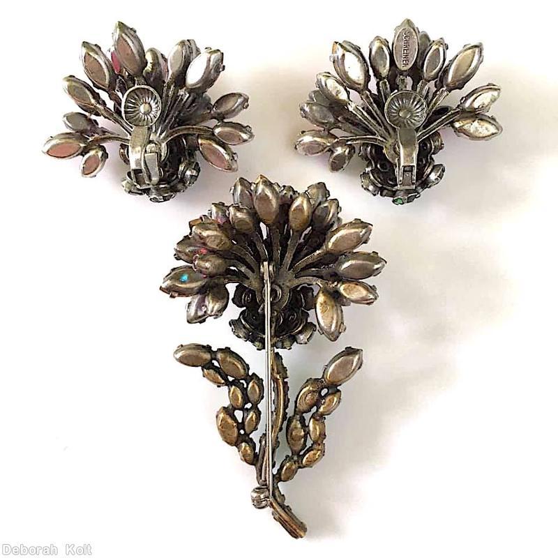 Schreiner carnation pin 6 small baguette curly stem half clustered ball receptacle 2 level petal bottom 8 petal ab pink navette petal dark green silvertone jewelry