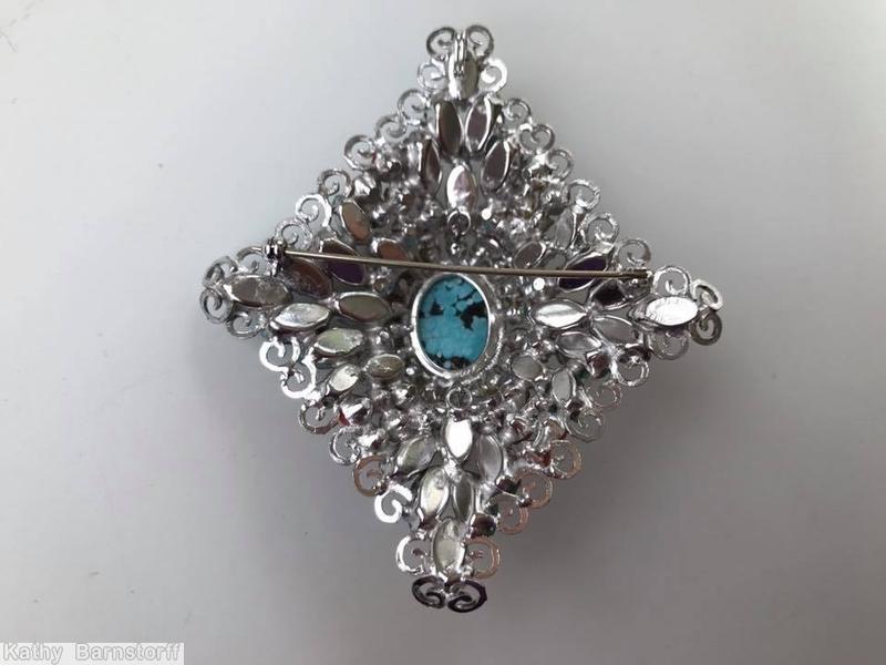 Schreiner domed radial diamond shaped pin large oval center 18 surrounding small chaton 18 navette scrollwork turquoise matrix coral faux pearl silvertone jewelry