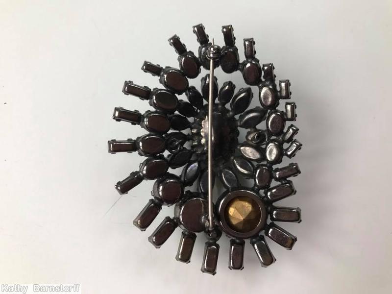 Schreiner eccentric 3 round swirled radial pin 1 large oval cab 1 large chaton 3 rounds surrounding brown amber crystal jewelry