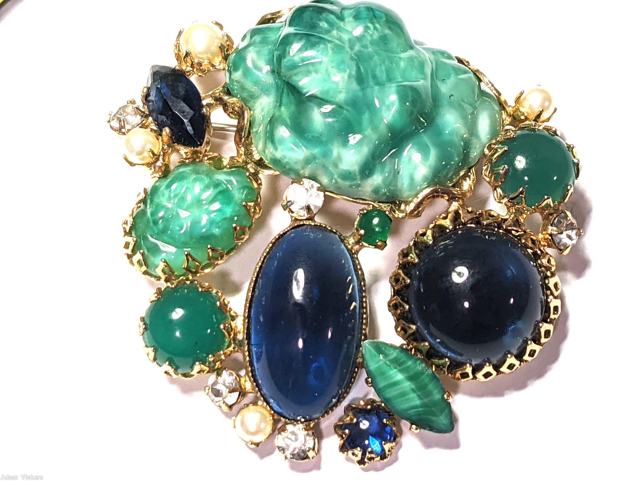 Schreiner end of day with large moon rock randome arranged mix of large oval cab large round cab navette chaton large jade moon rock navy large oval cab navy large round cab marbled jade large navette faux pearl crystal small chaton goldtone jewelry