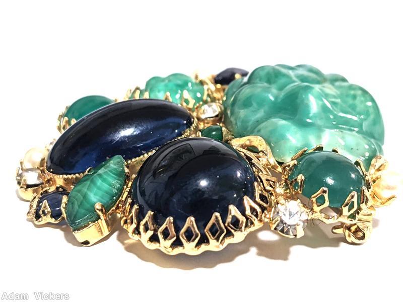Schreiner end of day with large moon rock randome arranged mix of large oval cab large round cab navette chaton large jade moon rock navy large oval cab navy large round cab marbled jade large navette faux pearl crystal small chaton goldtone jewelry