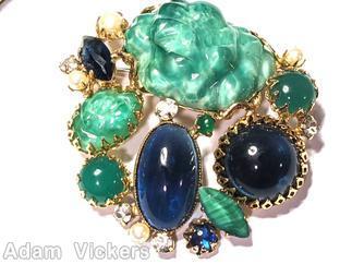 Schreiner end of day with large moon rock randome arranged mix of large oval cab large round cab navette chaton large jade moon rock navy large oval cab navy large round cab marbled jade large navette faux pearl crystal small chaton goldtone jewelry