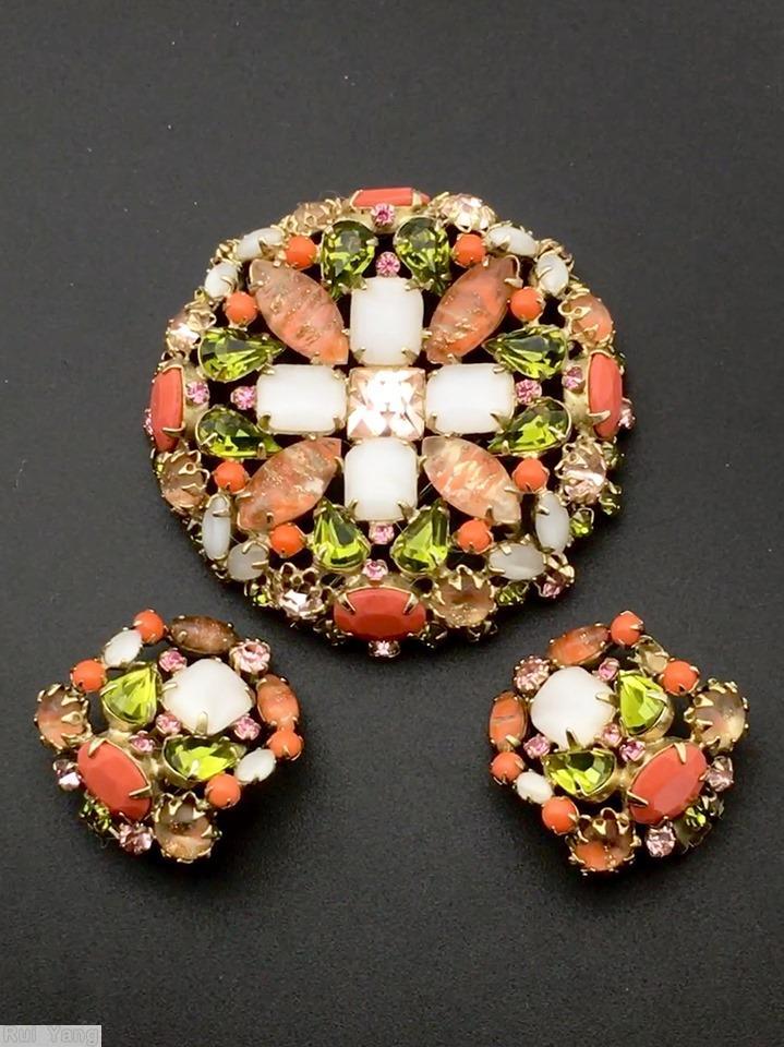 Schreiner hexagonal domed radial concave flat top pin small chaton center 6 surrounding navette 6 round stone on side wall peach venetian moonglow white peridot coral pink peach jewelry