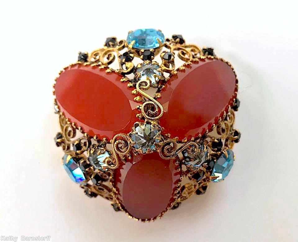 Schreiner high domed radial 3 large oval cab pin scrollwork 3 large chaton 21 small chaton carnelian oval flat top stone ice blue inverted goldtone jewelry