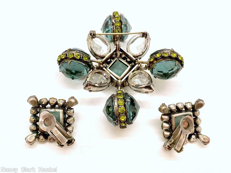 Schreiner large back to back pointy faceted stone cross pin raised faceted square center 4 large faceted teardrop smoky green large pointed faceted stone olivine small inverted stone large crystal faceted teardrop jewelry