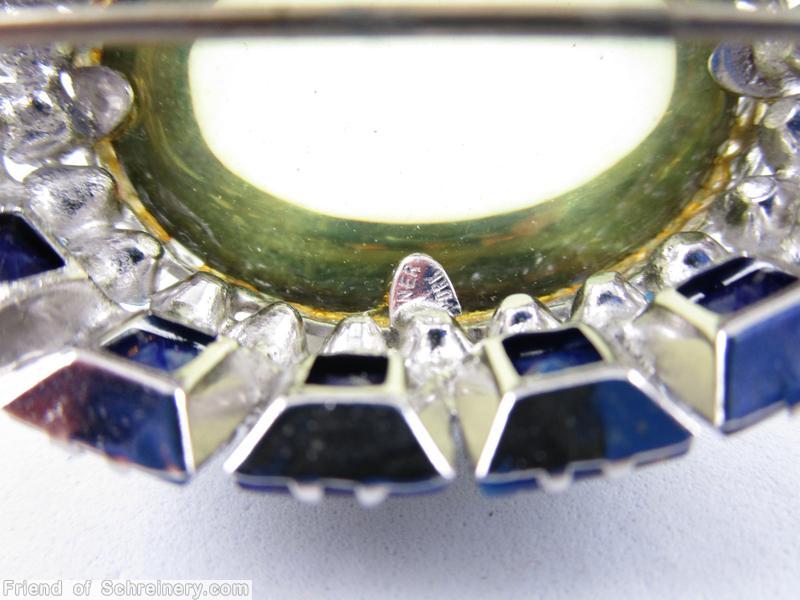 Schreiner large highly domed oval shaped jelly belly pin large half egg shaped jelly belly center 15 small square stone at side ice peridot lapis blue ice blue silvertone jewelry