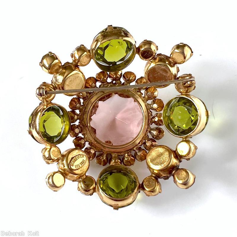 Schreiner large round stone center high domed round pin 8 pointy stone side clear peach large round faceted crystal center clear peridot large pointy stone clear lavender pointy stone ab chaton goldtone jewelry