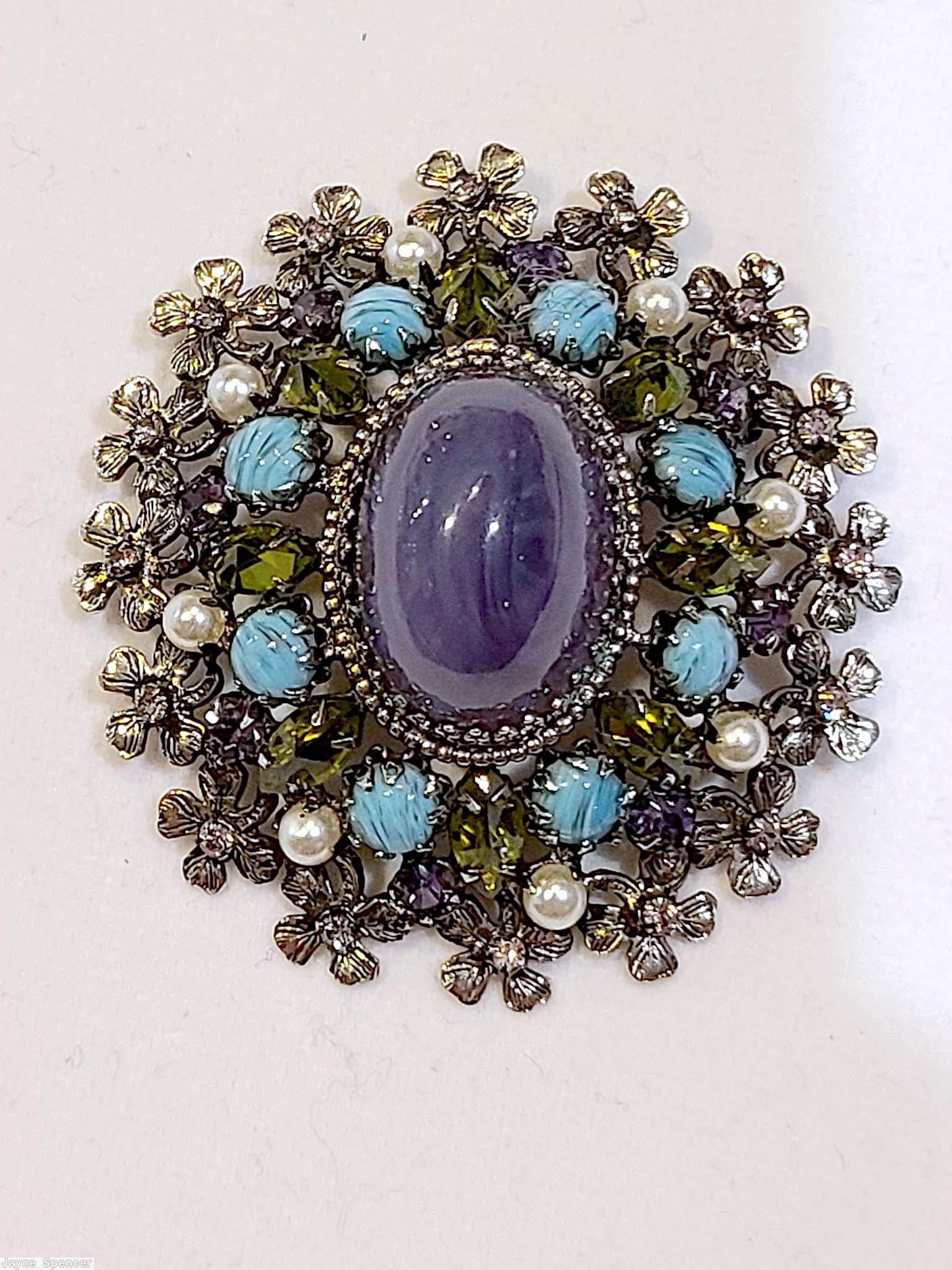 Schreiner oval 16 metal flower radial pin large oval cab center 8 surrounding small navette 8 small chaton large marbled purple oval cab center turquoise small round cab peridot inverted stone faux pearl silvertone jewelry