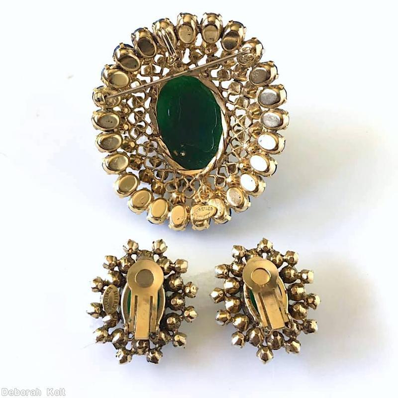 Schreiner oval domed radial pin large oval center 23 surrounding small chaton 3 rounds filigree lapis small oval cab faux pearl crystal small chaton goldtone jewelry
