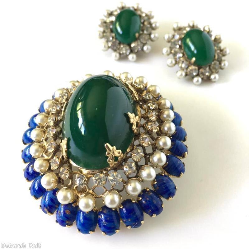 Schreiner oval domed radial pin large oval center 23 surrounding small chaton 3 rounds filigree lapis small oval cab faux pearl crystal small chaton goldtone jewelry