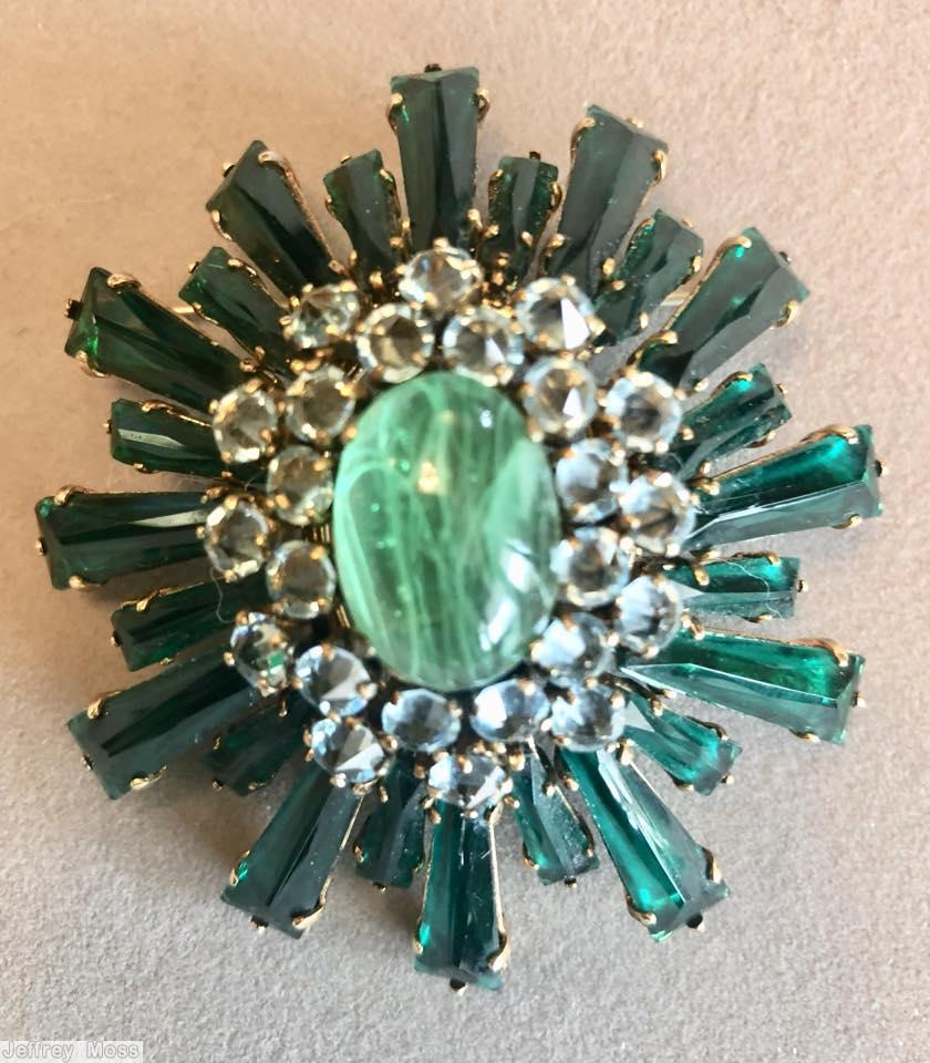 Schreiner oval high domed keystone ruffle pin large oval center varied length keystone emerald keystone 2 rounds inverted ice blue stone marbled green large oval cab center jewelry