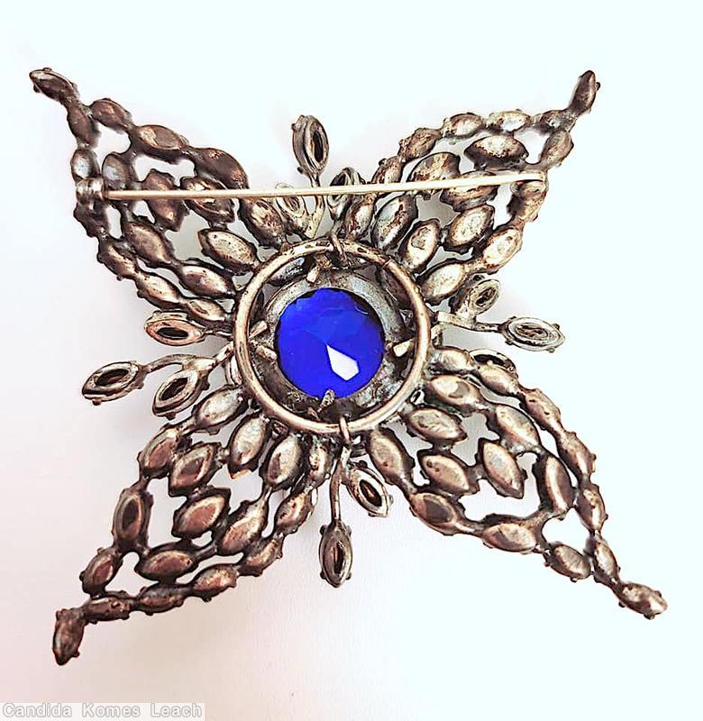 Schreiner radial 4 leaf navette pin large round center stone 9 surrounding navette 4 small single navette branch blue faceted large round center stone dark blue navette ice blue navette silvertone jewelry