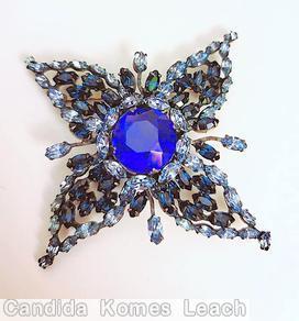 Schreiner radial 4 leaf navette pin large round center stone 9 surrounding navette 4 small single navette branch blue faceted large round center stone dark blue navette ice blue navette silvertone jewelry