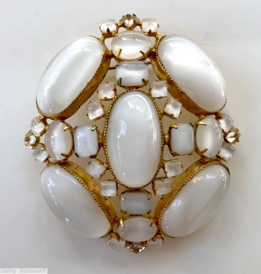 Schreiner rectangle shaped radial pin 5 large oval cab 1 center large oval stone 4 surrounding emerald cut 8 surrounding small square stone 4 small oval cab moonglow white goldtone jewelry