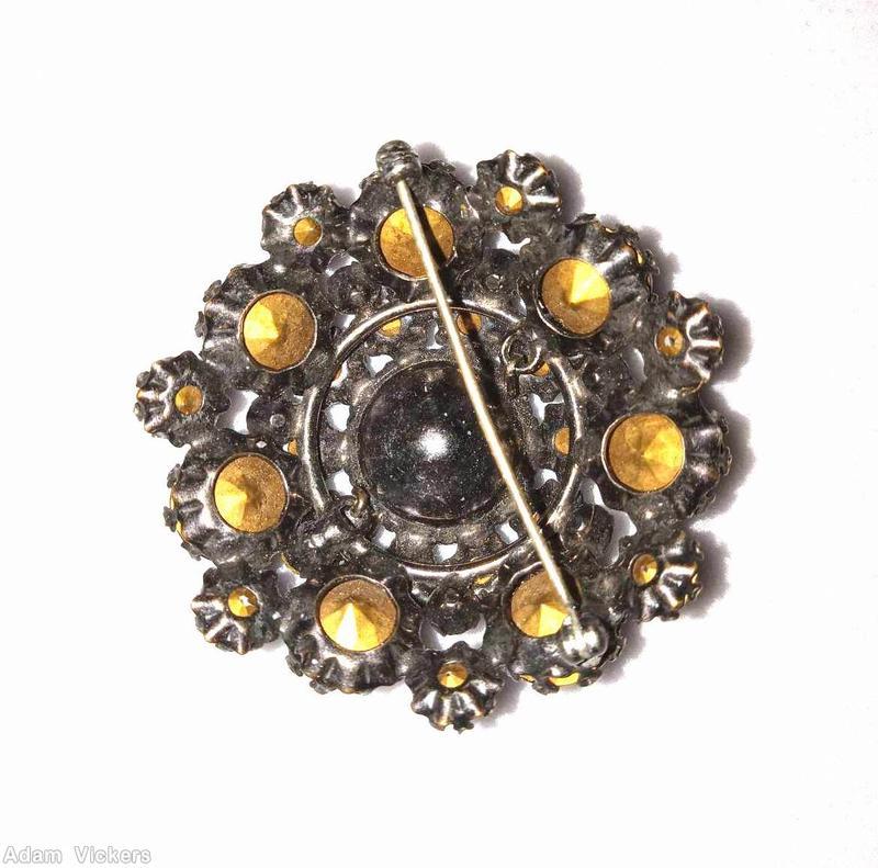 Schreiner round domed pin large round cab center 10 surrounding small chaton 7 large chaton large faceted topaz round chaton center crystal faceted surrounding chaton large topaz chaton silvertone jewelry