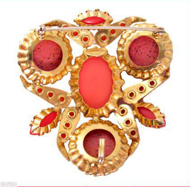 Schreiner triangle radial pin 3 large round cab 6 leaf shaped metal with varied size chaton embedded large oval cab center 3 navette matrix coral large round cab large oval coral cab goldtone jewelry