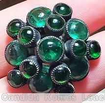 Schreiner star shaped domed radial 2 level button chaton center top level 5 chaton surrounding bottom level 5 large chaton 5 small chaton emerald open back jewelry