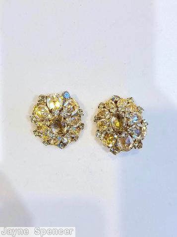 Schreiner domed radial oval shaped earring oval cab center 3 rounds 10 surrounding small chaton middle round 9 oval cab 9 small chaton outside clear champagne goldtone jewelry